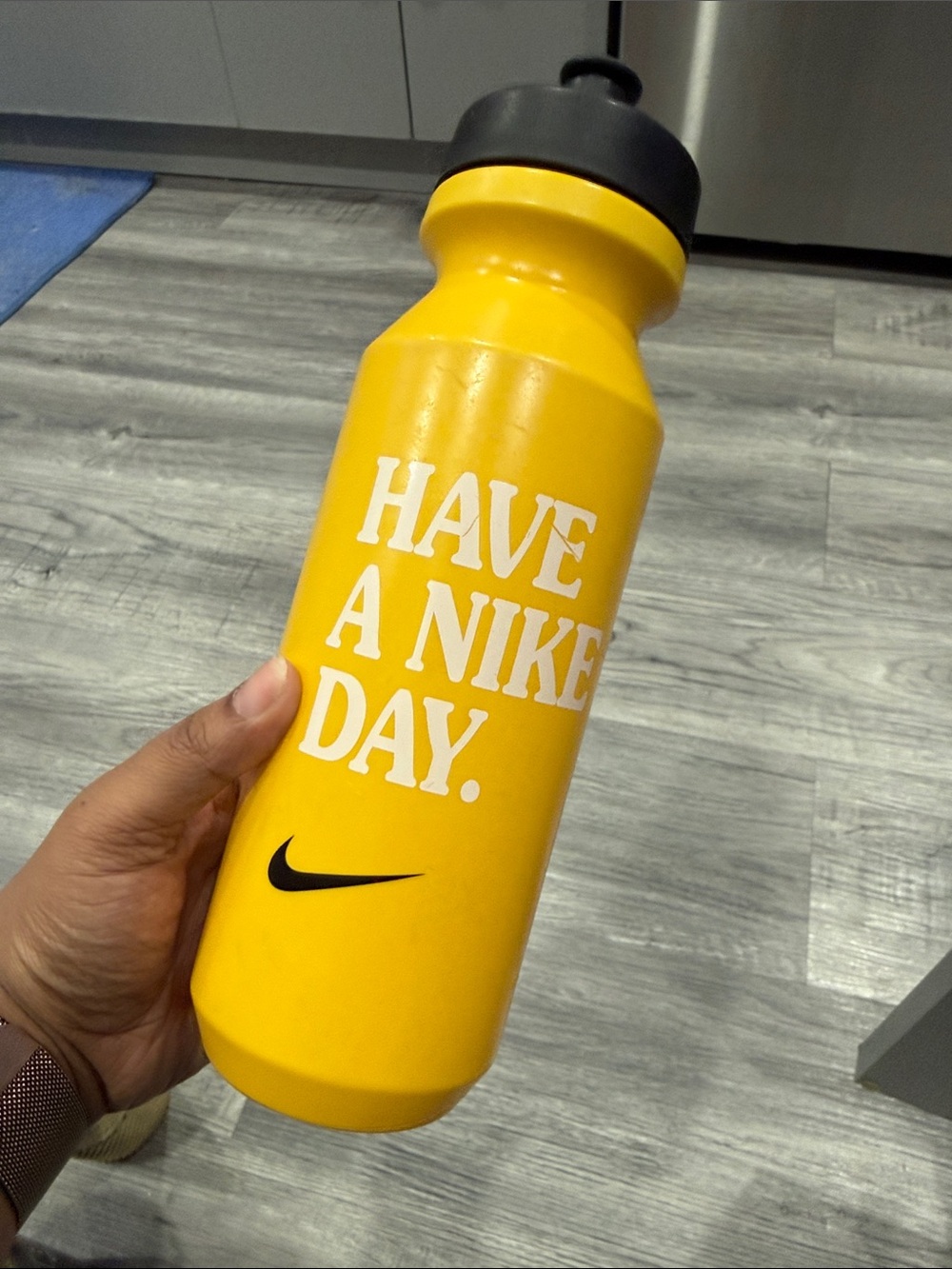 Nike Yellow Water Bottle with Black Lid and Swoosh